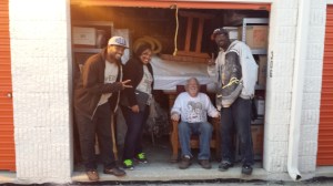 Annie and the movers at the bitter end, with light fading and storage unit stuffed full.