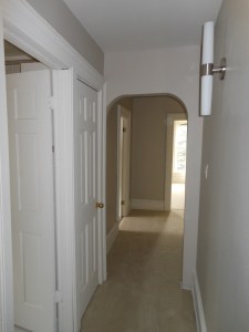 Upstairs hall looking east to the street.